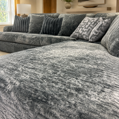 Galactic 2-Piece Sectional in Dark Gray in an inviting contemporary living room